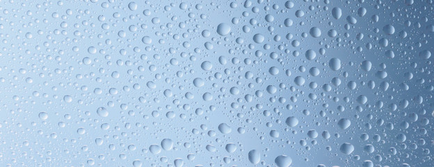 Water drops color background rain glass space rainbow.