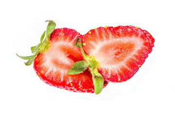 Ripe raw whole and sliced organic strawberry, isolated on white background