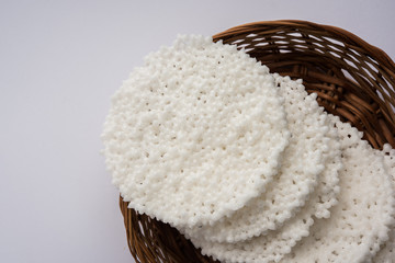 Basundi Or Rabri is an Indian sweet popular in Gujarat and Maharashtra. It is a sweetened condensed milk. Garnished with Dry fruits and Saffron. Served in a bowl over moody background. Selective focus