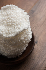 Barley water in glass with raw and cooked pearl barley wheat/seeds. selective focus