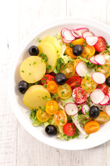 vegetable salad with potato,radish and tomato