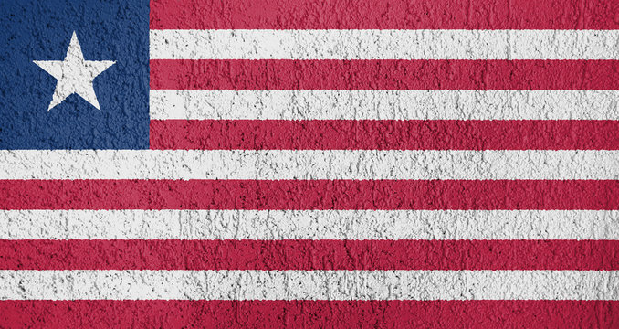 Texture of Republic of Liberia flag on a white wall of plaster.