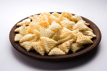 Basundi Or Rabri is an Indian sweet popular in Gujarat and Maharashtra. It is a sweetened condensed milk. Garnished with Dry fruits and Saffron. Served in a bowl over moody background. Selective focus