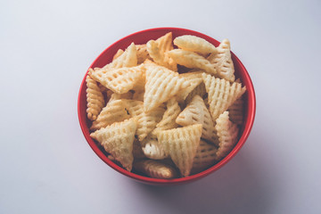 Barley water in glass bottle with raw and cooked pearl barley wheat/seeds. selective focus