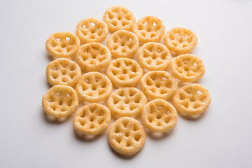 Kaju Katli is a Diamond shape Indian sweet made using cashew sugar and mava, served in a plate or bowl over moody background. selective focus