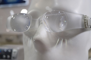 An image of a dummy's head in dental glasses.