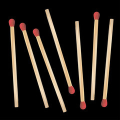 matches scattered on a black background object