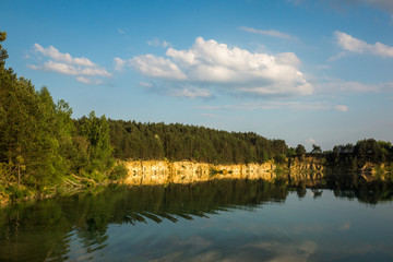 Turquoise lake Wapienniki near Sulejow, Lodzkie, Poland