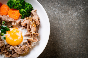 donburi, pork rice bowl with onsen egg and vegetable