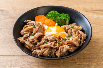 donburi, pork rice bowl with onsen egg and vegetable