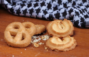 fresh sweet cookies on wooden in background