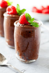 Glasses Of Homemade Chocolate Mousse With Raspberries