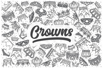 Hand drawn crowns vector doodle set.