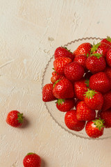 Fresh strawberries on a glas plate, plateau. Isolated. 