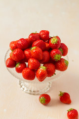 Fresh strawberries on a glas plate, plateau. Isolated. 