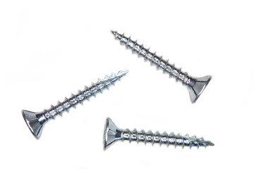 Self tapping screws for wood on a white background - obrazy, fototapety, plakaty