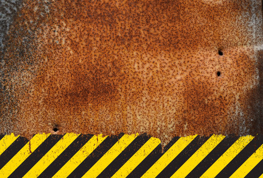 Rusty metal background with grunge hazard sign