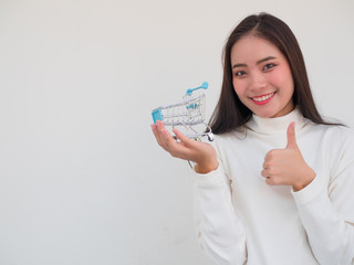 Pretty Thai lady happy and smile for shopping
