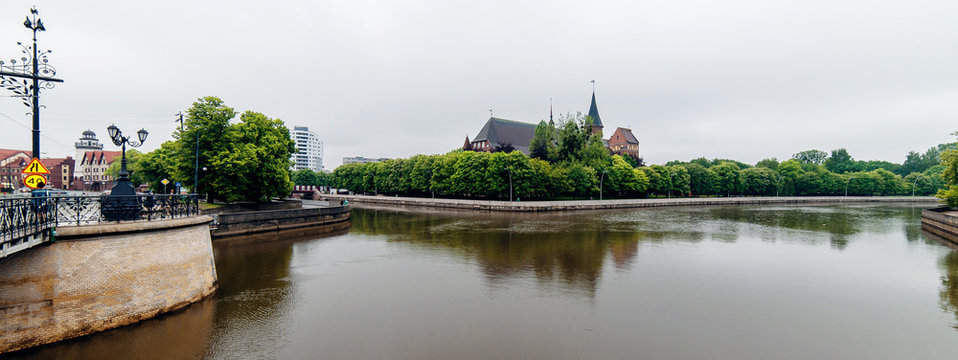 Kaliningrad city with Kant`s island and cathedral on a background and river on a foreground