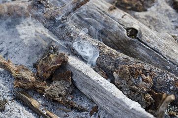 The smoke starting and getting ready to break into a fire. 