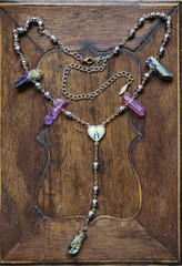 natural stone necklace on wooden background