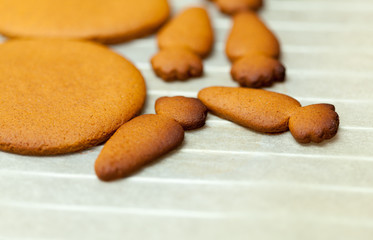 Fototapeta premium close up of female hands making cookies from fresh dough at home