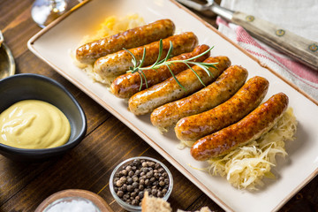 Juicy Grilled Sausages with Cabbage Salad, Mustard and Beer
