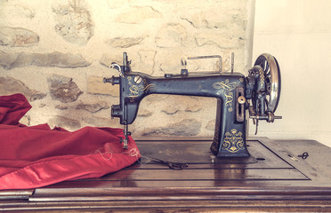 Old sewing machine in retro style
