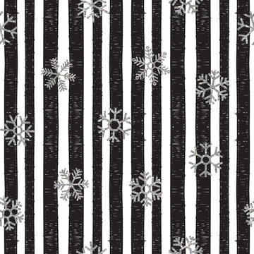 Abstract pattern of falling snowflakes © ekmelica