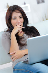 Fototapeta na wymiar surprised business woman watching in laptop