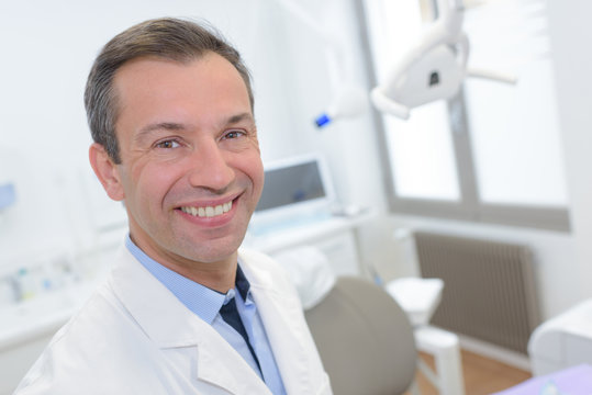 a smiling dentist