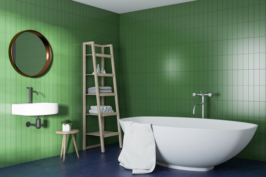 Green bathroom conrer, white bathtub