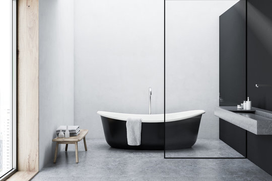 Bronze bathtub, white walls