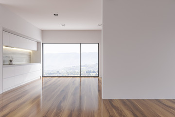 White countertops in loft kitchen, wall, mountain