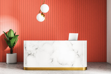 Marble reception table in red wall office