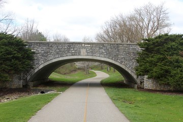 The stone bridge on the parks pathway.