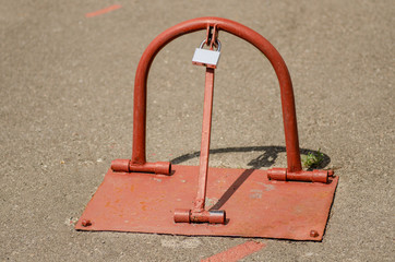 parking space stop with lock metal triangle red