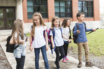 Obraz premium A Group of students outside at school standing together