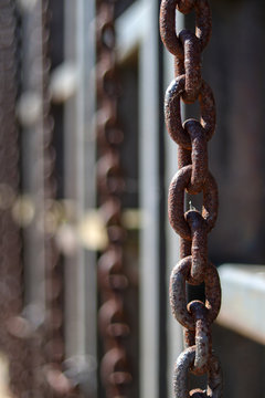 Big old rusty metal chain in port bataviawerf, zoomed in and clear depth of field