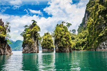 Mountain scenery with with tropical rain forest in the background and blue water lake in the...