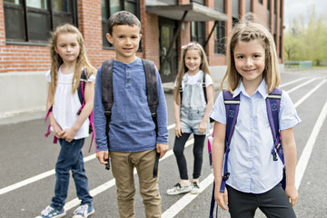 Obraz premium A Group of students outside at school standing together