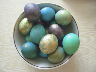 Some colorful eggs in a plate for the Easter