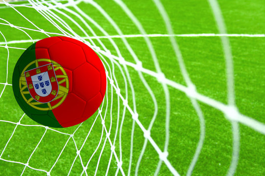 3d rendering of a soccer ball with the flag of Portugal in the net.