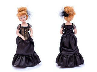 Porcelain doll with red hair in a long black vintage dress, front and back view