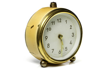 vintage alarm clock ringing at 5:30 isolated on white background