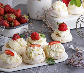 baked meringue with cream and fresh strawberries