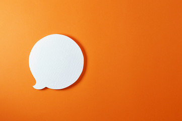 circle text bubble on orange background