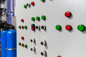 Industrial factory boiler room control panel with buttons and signal lamps