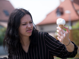 Melting ice in the hand of a girl