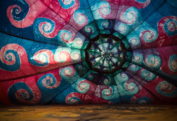 A creative, colorful design inside a hot air balloon. 